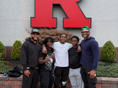 Franklin Township Officers Treat Local Youth to Rutgers Football Game in a Night of Mentorship and Community Connection